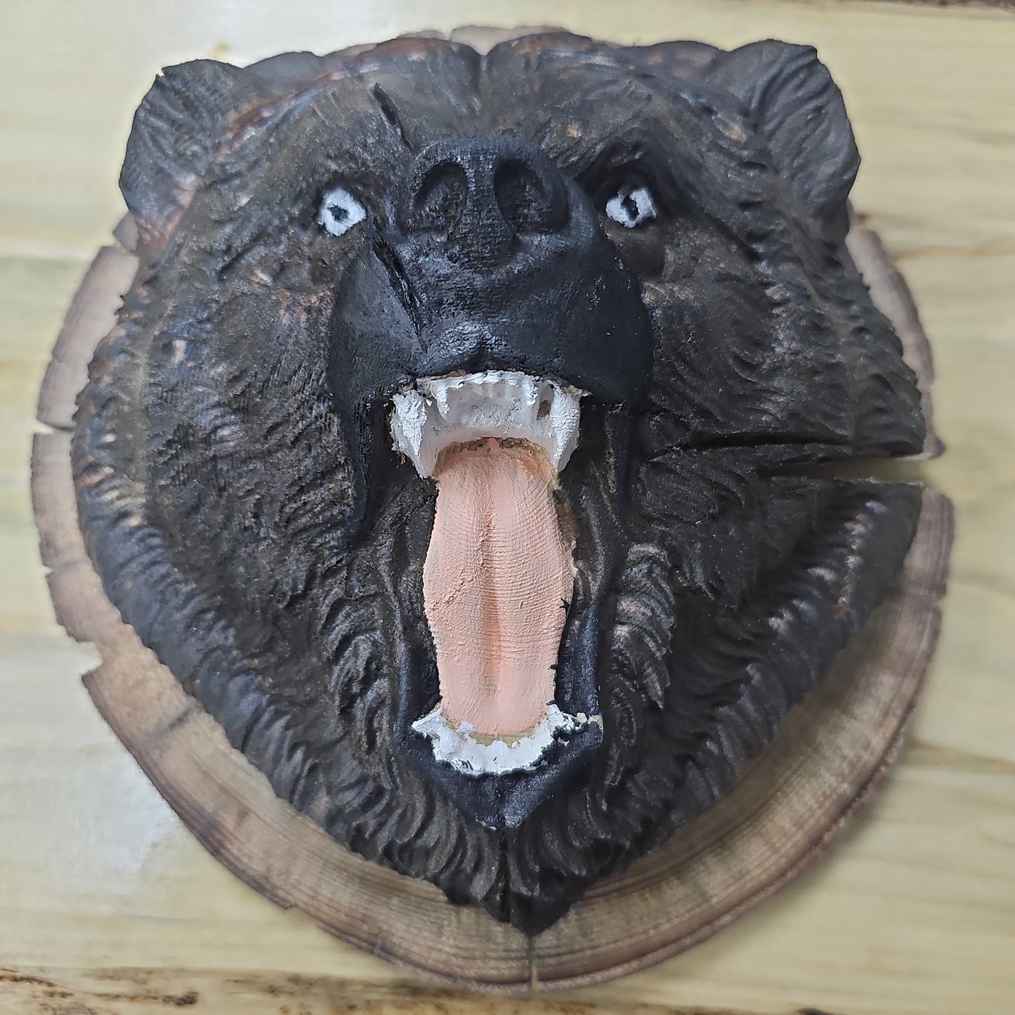 Painted wood carving bear head
